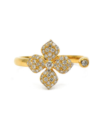 Floral Pavé Ring with four petals made of yellow gold and diamonds. The ring is open shank, with a bezel set diamond.