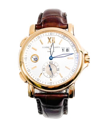 Goldtone Ulysses Nardin Dualtime watch with white dial, bars for markers.